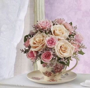 Victorian Teacup Pink spray roses in a teacup