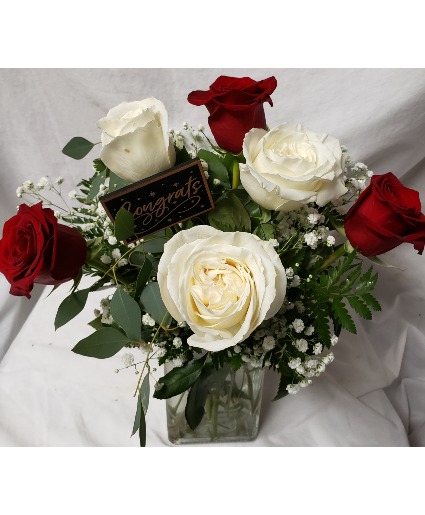 3 red and 3 white roses arranged in a vase with  CONGRATS pic!