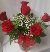 6 Red Roses arranged in a vase with baby's breath and bow!