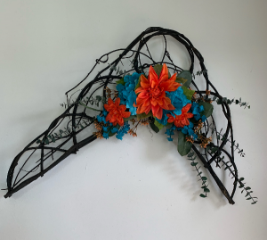 wall hanging in orange and teal Silk flower arrangement wall hanging