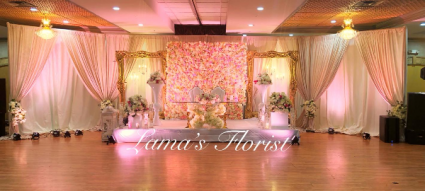 Flower wall with Golden Indian frames with Luxury Chairs