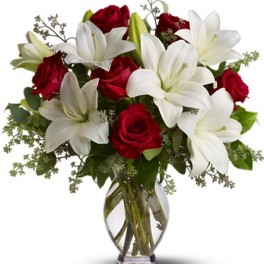 Warm whispers Lilies and roses