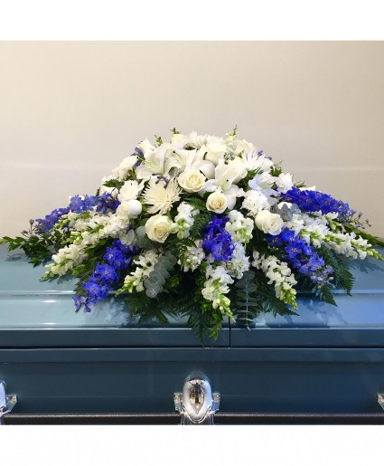White and Blue Casket spray Funeral flowers 