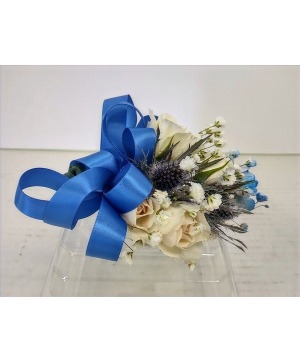White and blue corsage 