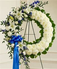 white and blue with blue ribbon open wreath funeral