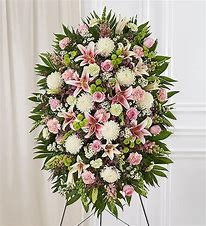 white and pink standing spray funeral