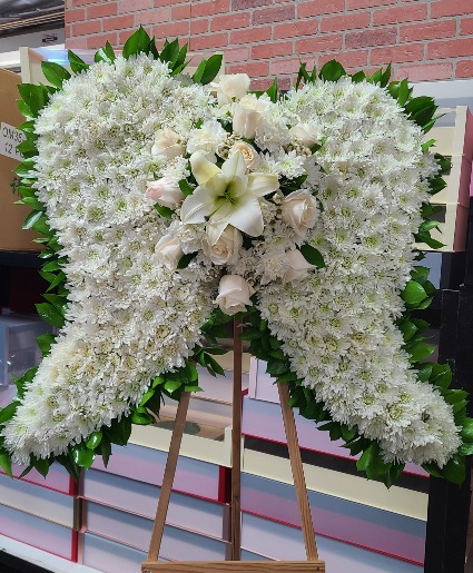 white angel wings standing wreath funeral