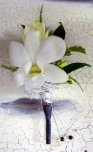 White as snow orchid boutonniere