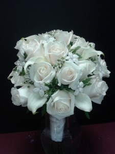 White bridal bouquet White roses and Stephanotis