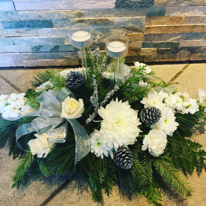White centerpiece with two candles 