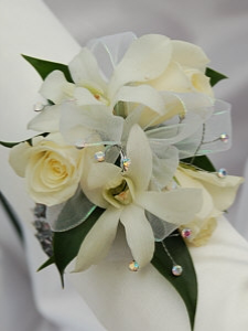 White Dendrobium orchid corsage With white roses! 