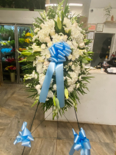 White flowers and roses with lilies Gone from our sight, but never from our hearts.