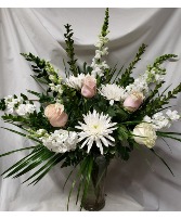 White flowers with a touch of pale pink roses  Arranged