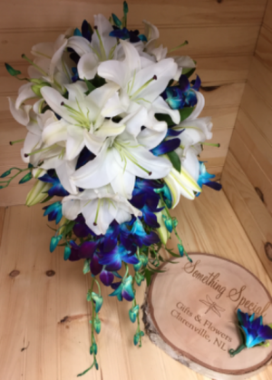 White lilies and dendrobium orchids Wedding bouquet