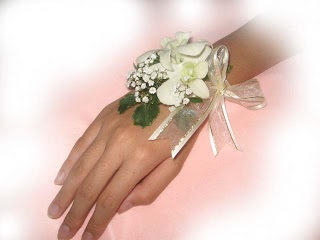 white orchid wristlet corsage