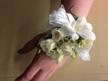 White rose and orchid Wrist Corsage in Fairfield, CT | Blossoms at Dailey's Flower Shop