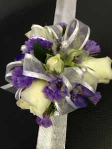 purple and white corsage