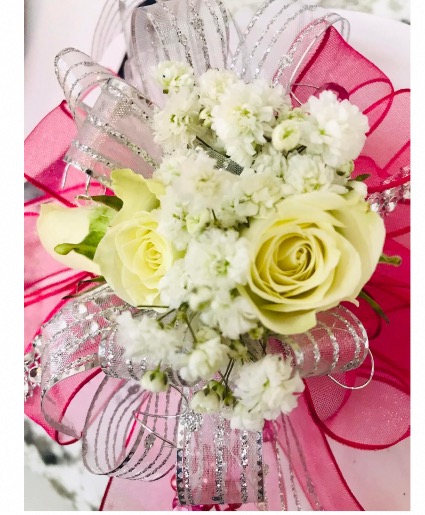 White roses with hot pink ribbon 