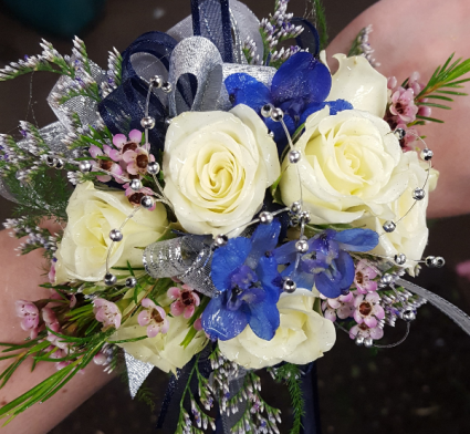 White Roses with touch of Blue Wrist Corsage