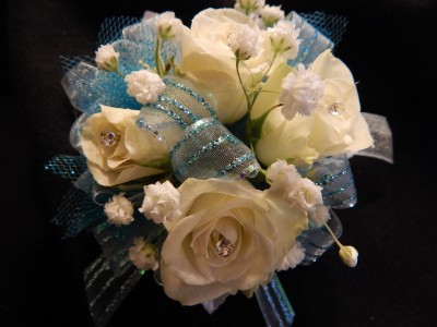 White Sweetheart Roses with Light Blue Accent Corsage
