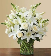 white sympathy vase white flowers in cylinder vase