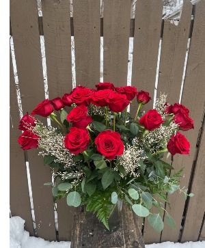 Who Loves You, Baby? 24 red roses in a vase