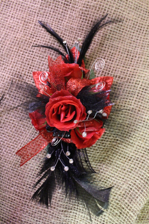 red and black corsage