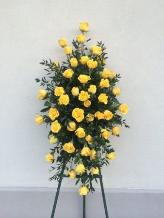 With Deepest Sympathy Yellow Rose Standing Spray in Corpus Christi, TX | Golden Petal Florist