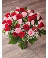 With love - four dozen - with lush greenery Four dozen roses