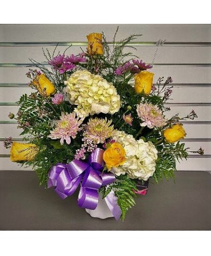 A Timeless Tribute with Yellow Roses Sympathy Arrangement