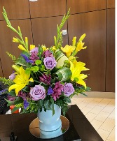 With yellow arrangement 