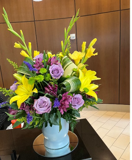 With yellow arrangement 