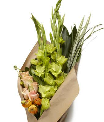 Wrapped Blooms A nice seasonal assortment of flowers wrapped in kraft paper for a nice presentation! Price 2 will get you a bigger bunch of flowers as will price 3. 
