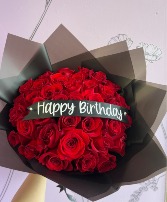Wrapped Red Roses 