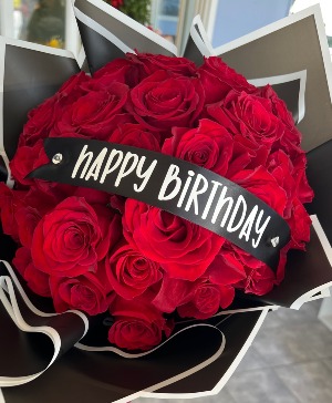 Wrapped Red Roses 