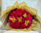 WRAPPED RED AND PINK ROSES WITH GOLD BUTTERFLIES 