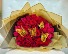 WRAPPED RED AND PINK ROSES WITH GOLD BUTTERFLIES 