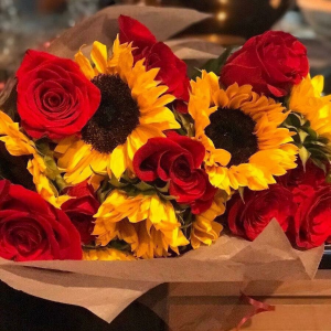 Wrapped Roses & Sunflowers HAND TIED BOUQUET in Charlotte, NC | Plush Blooms of Charlotte Wrapped Roses & Sunflowers HAND TIED BOUQUET in Charlotte, NC | Plush Blooms of Charlotte