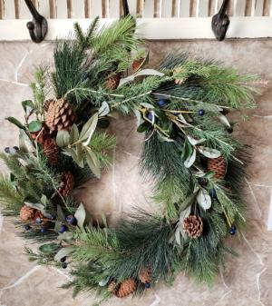 WREATH..22" Artificial but looks real with mixed Greens, pine cones,berries.Neutral and popular gift for door and/or table centerpiece. Only 2 left...Limited Supply
