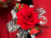 Wrist Corsage Beautiful silk red rose wrist corsage with double ribbon and sones.