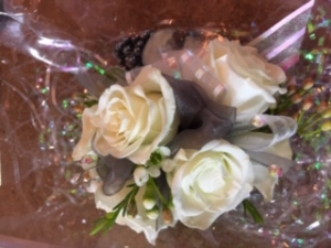 wrist corsage white with a pop of black prom corsage