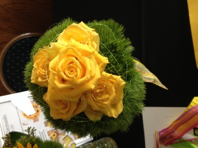 Yellow roses and green trick carnations hand tied bouquet