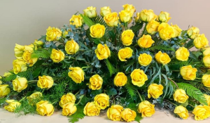 YELLOW ROSES  CASKET FLOWERS