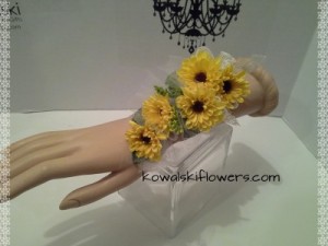 Yellow Viking Poms Wrist Corsages in Whitesboro, NY | KOWALSKI FLOWERS INC. Yellow Viking Poms Wrist Corsages in Whitesboro, NY | KOWALSKI FLOWERS INC.