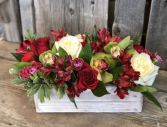 ZION'S BEAUTY Mix of fresh florals in a wooden box